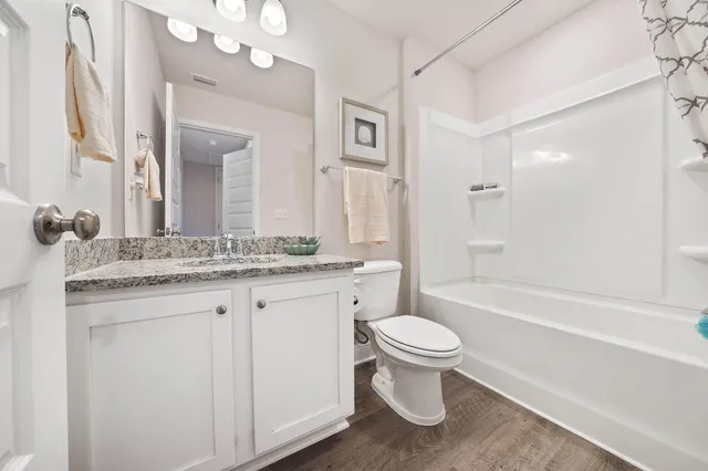 a front view of a house with a garage