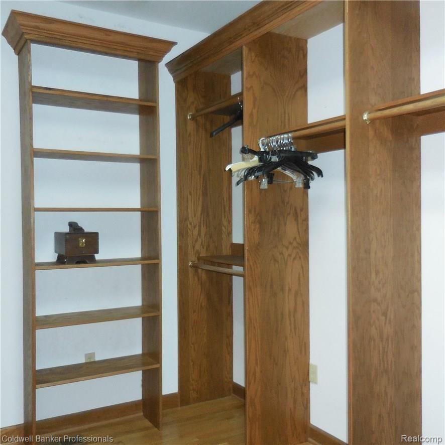 21591 Garfield Road Northville, MI 48167 - Photo 37 of 90 CUSTOM BUILT INS IN THE MASTER BEDROOM WALK IN CLOSET