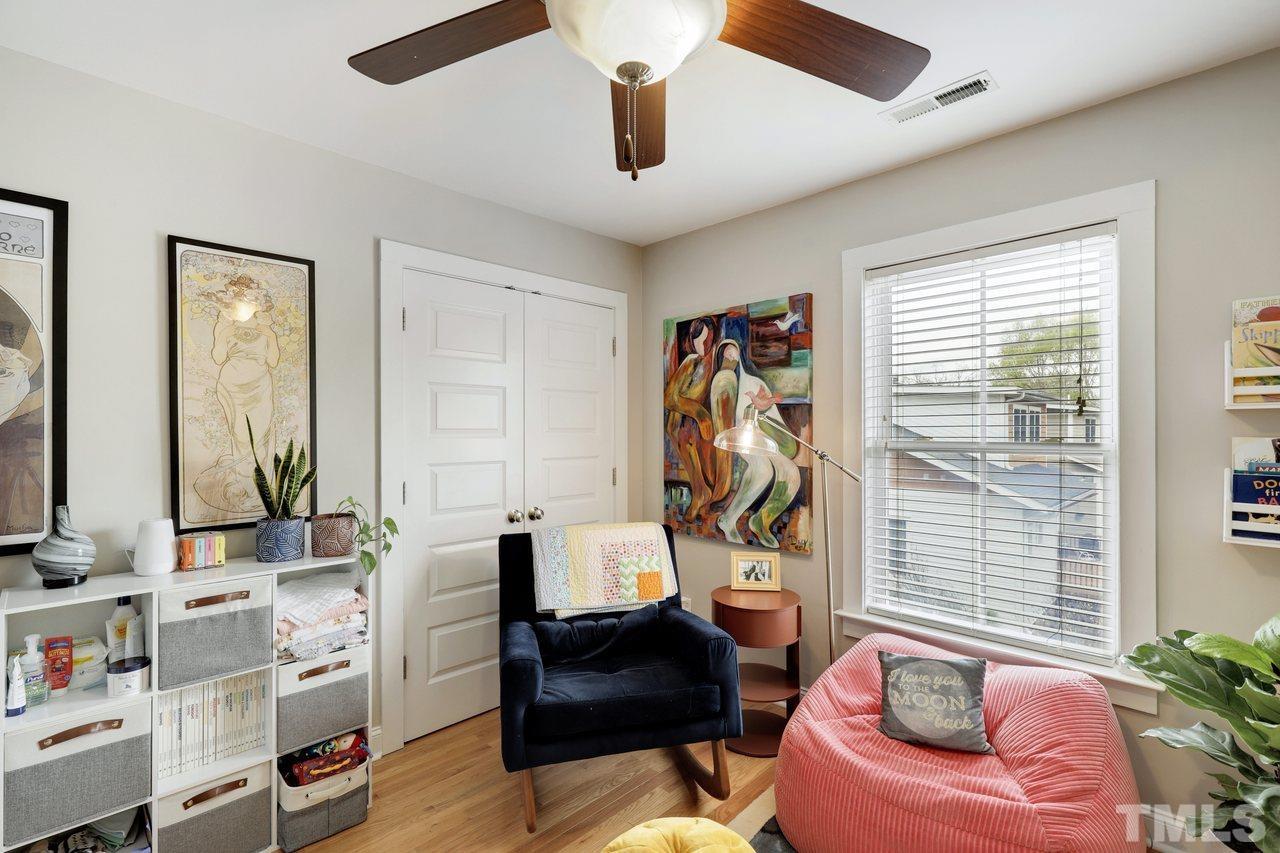 121 East Seeman Street Durham, NC 27701 - Photo 21 of 31 a living room with furniture and a flat screen tv