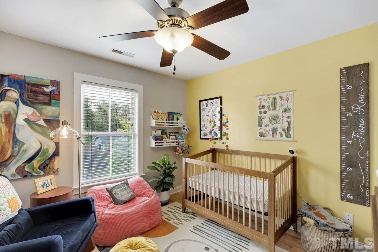 121 East Seeman Street Durham, NC 27701 - Photo 22 of 31 a bedroom with furniture and a window