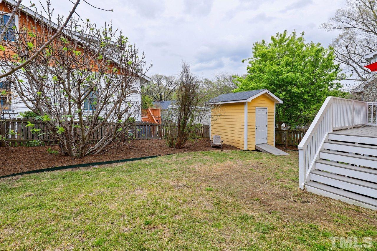 121 East Seeman Street Durham, NC 27701 - Photo 27 of 31 a view of a backyard with a house