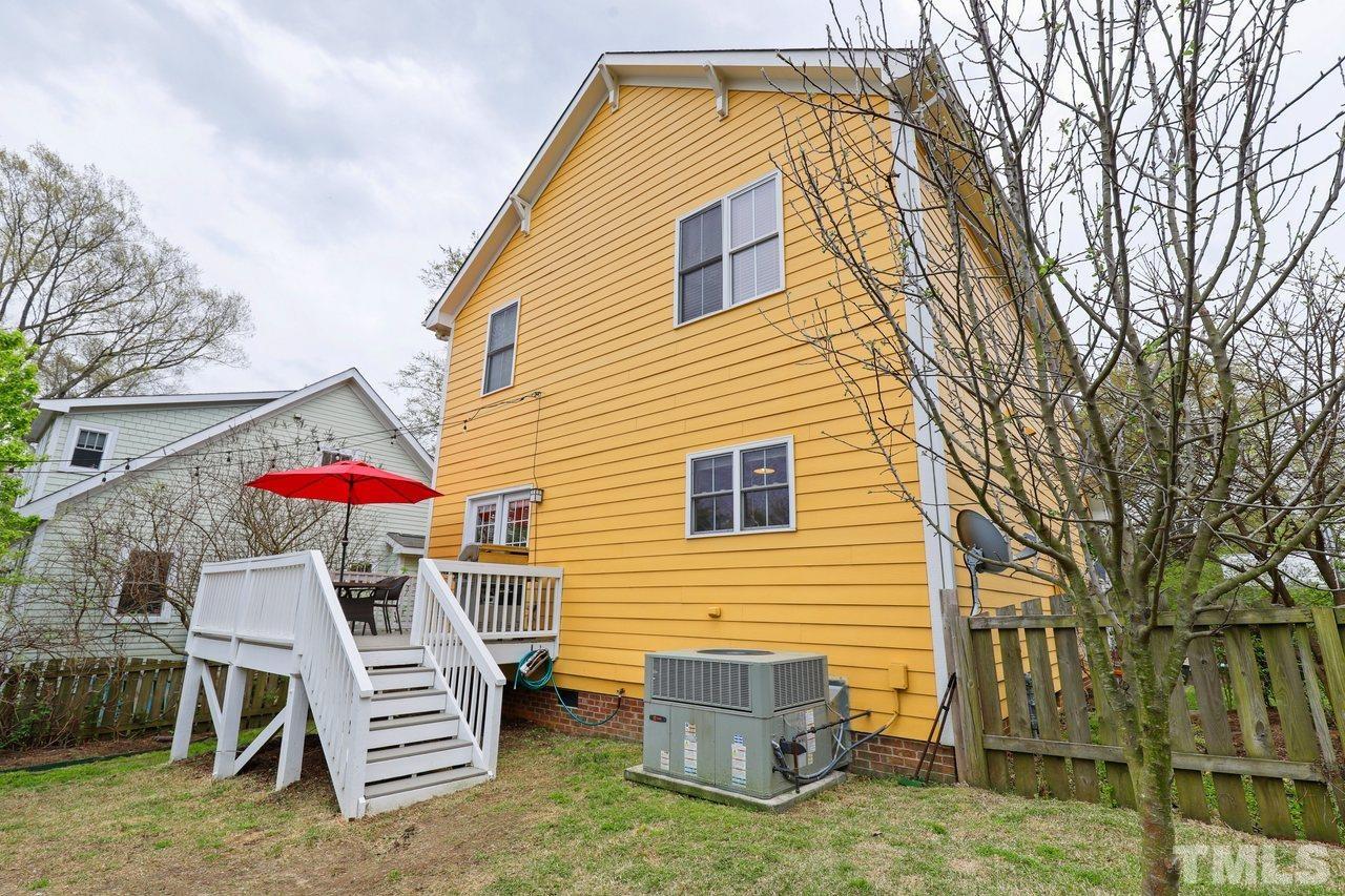 121 East Seeman Street Durham, NC 27701 - Photo 28 of 31 a view of a house with a yard and furniture