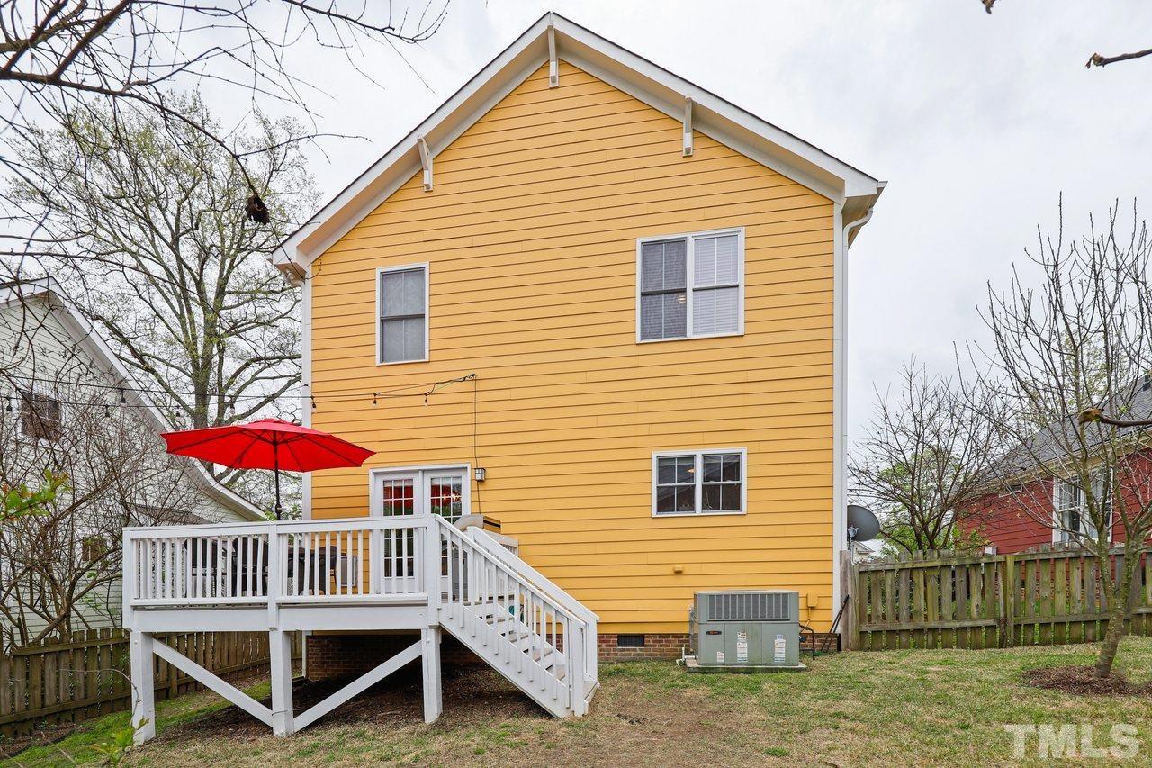 121 East Seeman Street Durham, NC 27701 - Photo 29 of 31 a view of a house with a yard and a deck