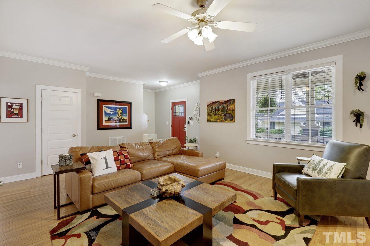121 East Seeman Street Durham, NC 27701 - Photo 3 of 31 a living room with furniture and a window