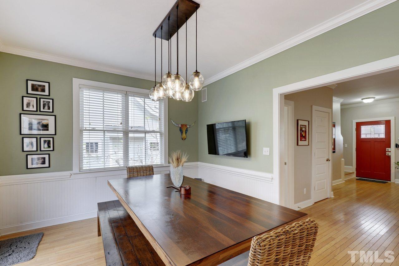 121 East Seeman Street Durham, NC 27701 - Photo 6 of 31 a view of a dining room with furniture window and wooden floor
