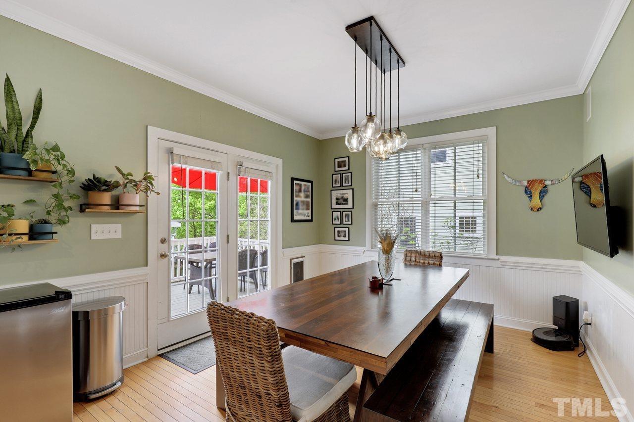 121 East Seeman Street Durham, NC 27701 - Photo 7 of 31 a view of a dining room with furniture window and outside view