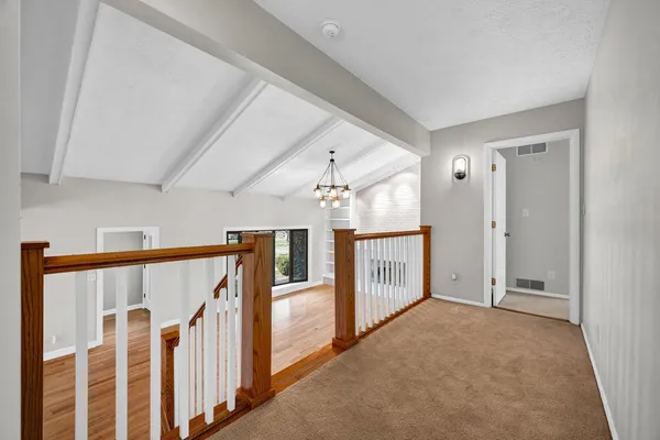 a view of a livingroom with a staircase