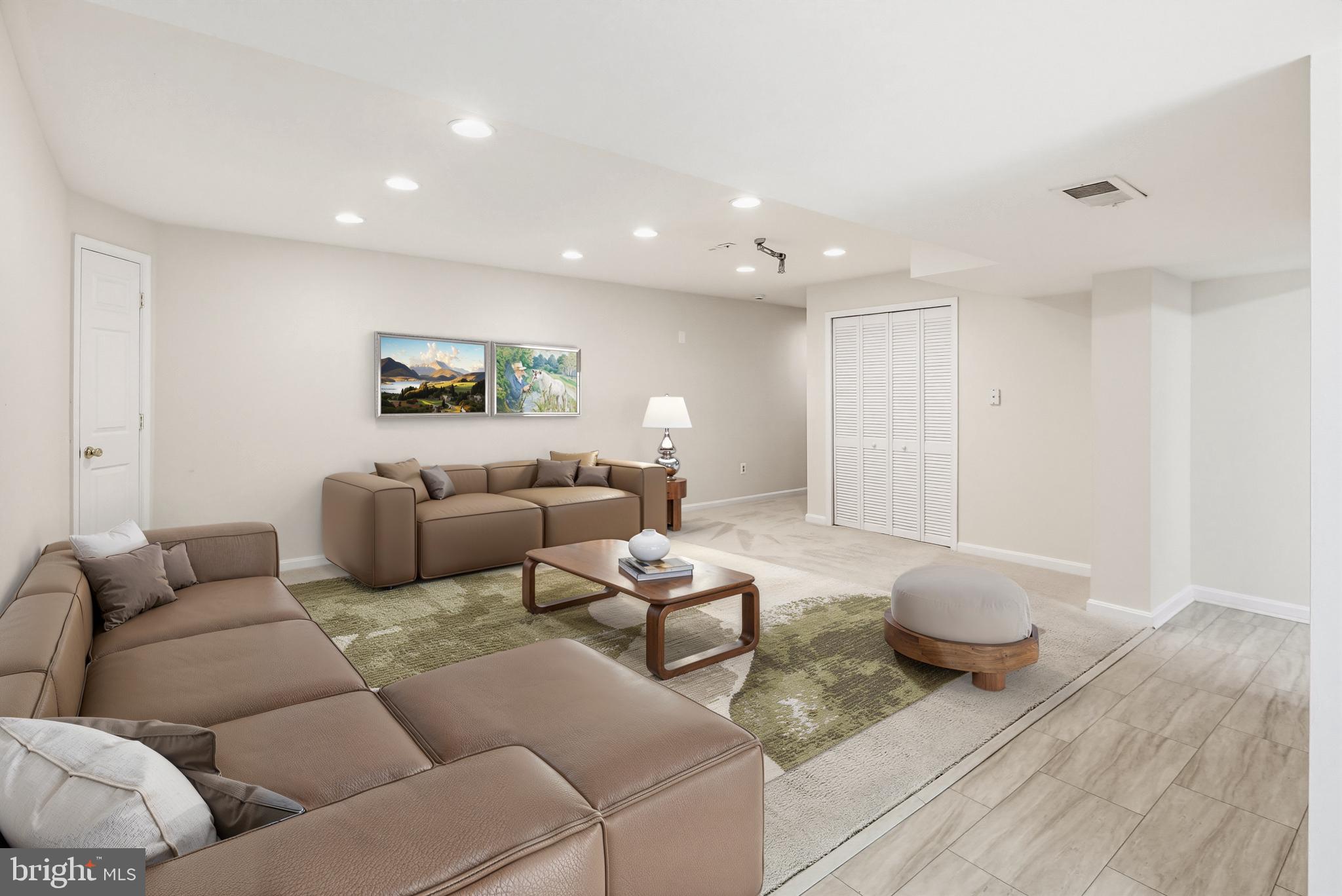 8266 Spring Branch Court Laurel, MD 20723 - Photo 45 of 73 Lower level recreation room virtually staged