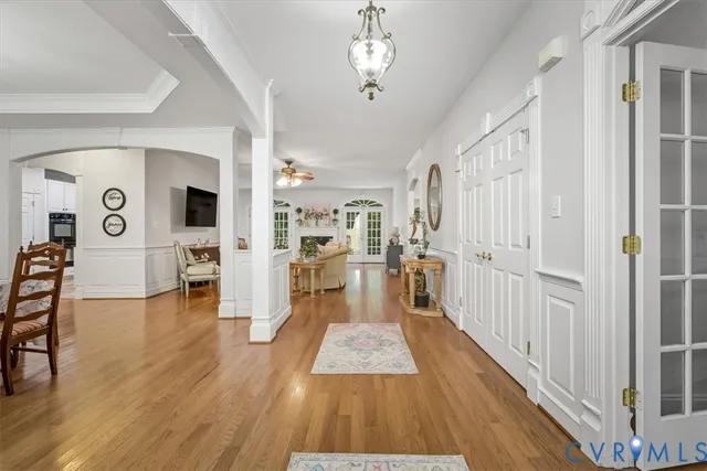a view of a living room and wooden floor