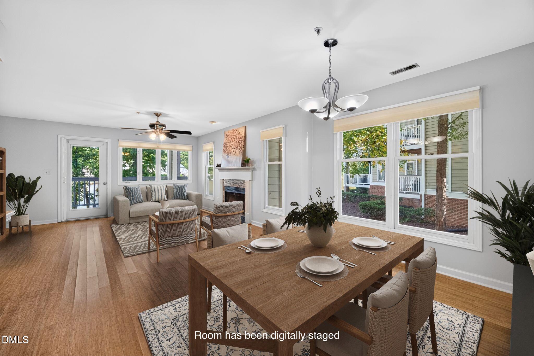 512 Springfork Drive Cary, NC 27513 - Photo 6 of 43 virtually staged family room and dining