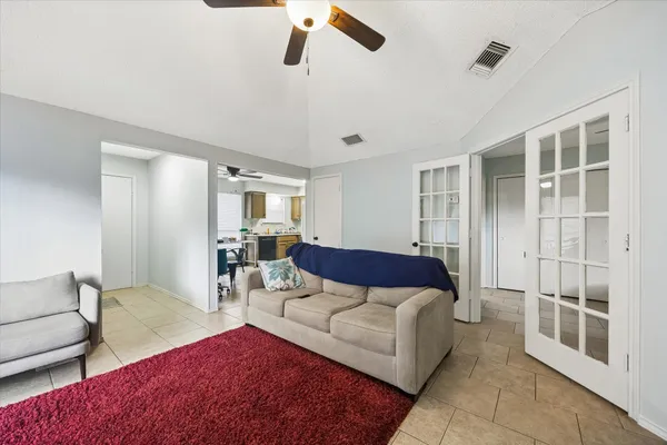 a living room with furniture and a window
