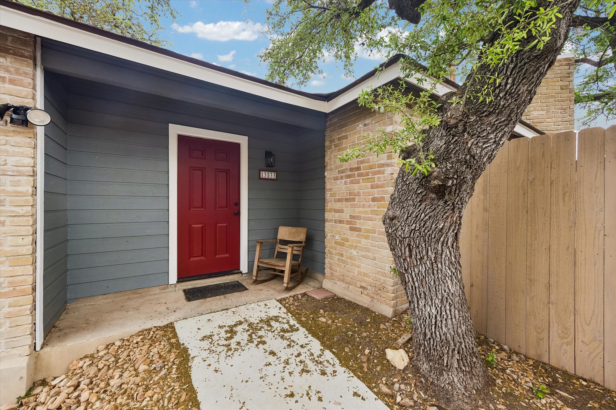 13533 George Road San Antonio, TX 78230 - Photo 7 of 34 a front view of a house with a yard
