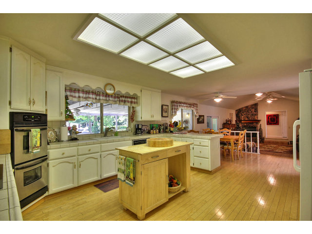 1300 Day Road Gilroy, CA 95020 - Photo 18 of 25 a kitchen with lots of counter top space and appliances