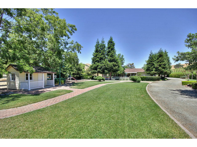 1300 Day Road Gilroy, CA 95020 - Photo 6 of 25 a view of a house with a big yard