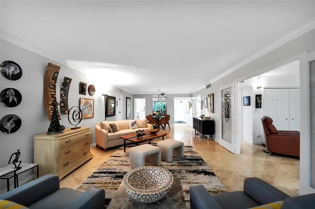 a bedroom with a large bed and a couch