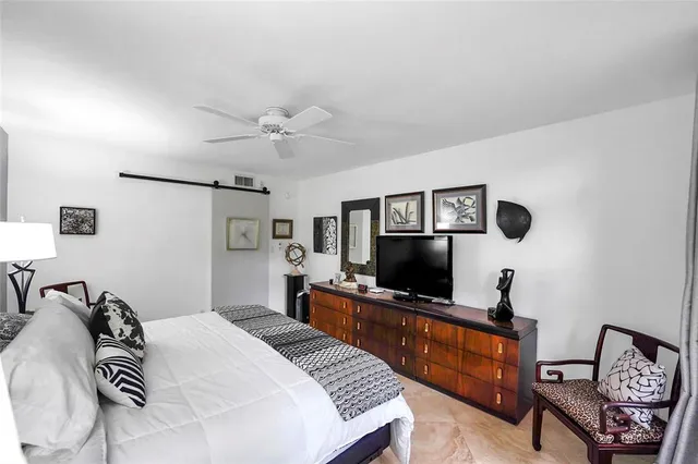 a view of living room with furniture and a flat screen tv