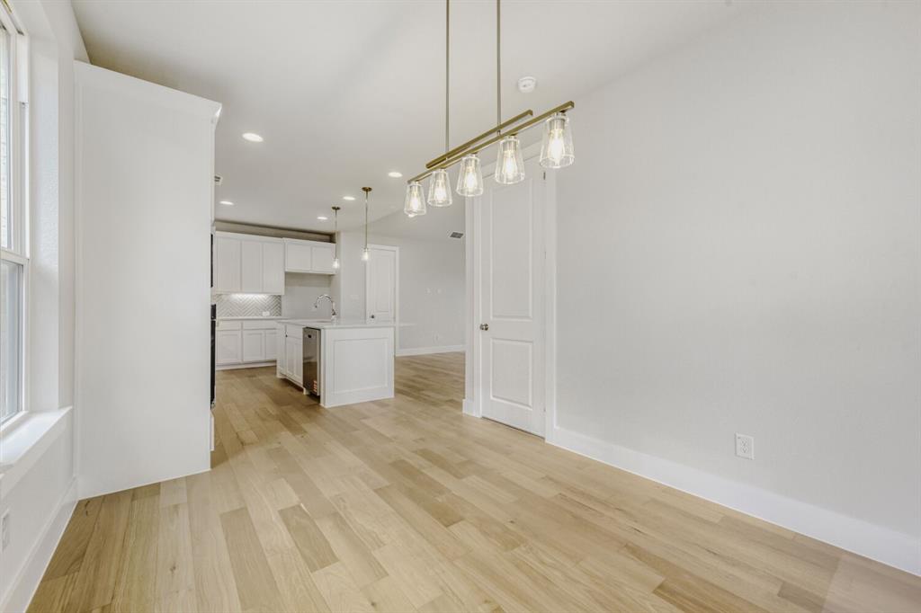 6033 Davis Knoll Road Fort Worth, TX 76126 - Photo 18 of 29 a view of a kitchen with a sink and cabinets
