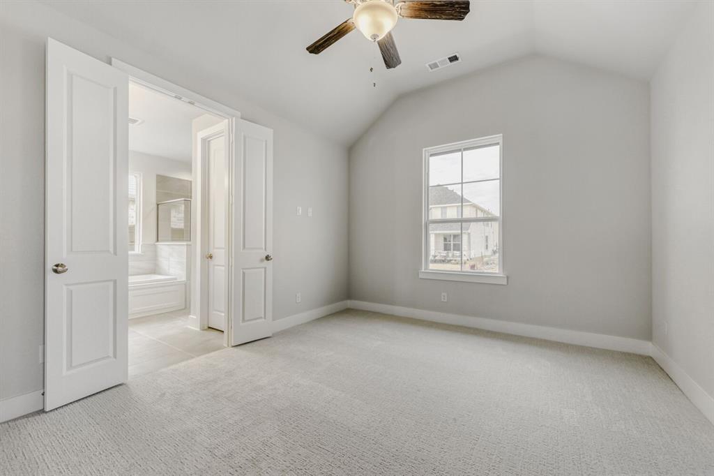 6033 Davis Knoll Road Fort Worth, TX 76126 - Photo 20 of 29 an empty room with a window