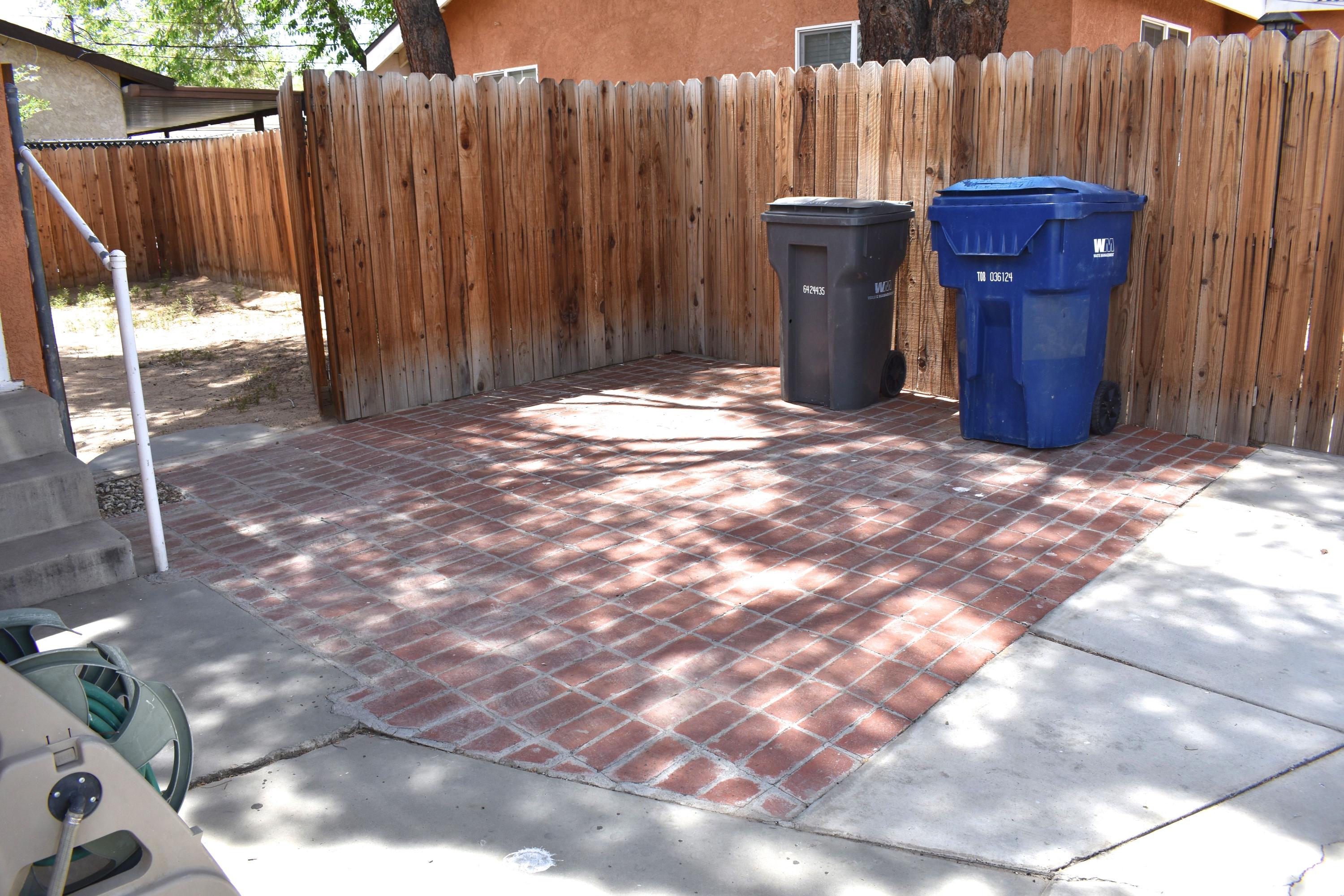 44527 Date Avenue Lancaster, CA 93534 - Photo 10 of 20 a view of outdoor space and wooden fence