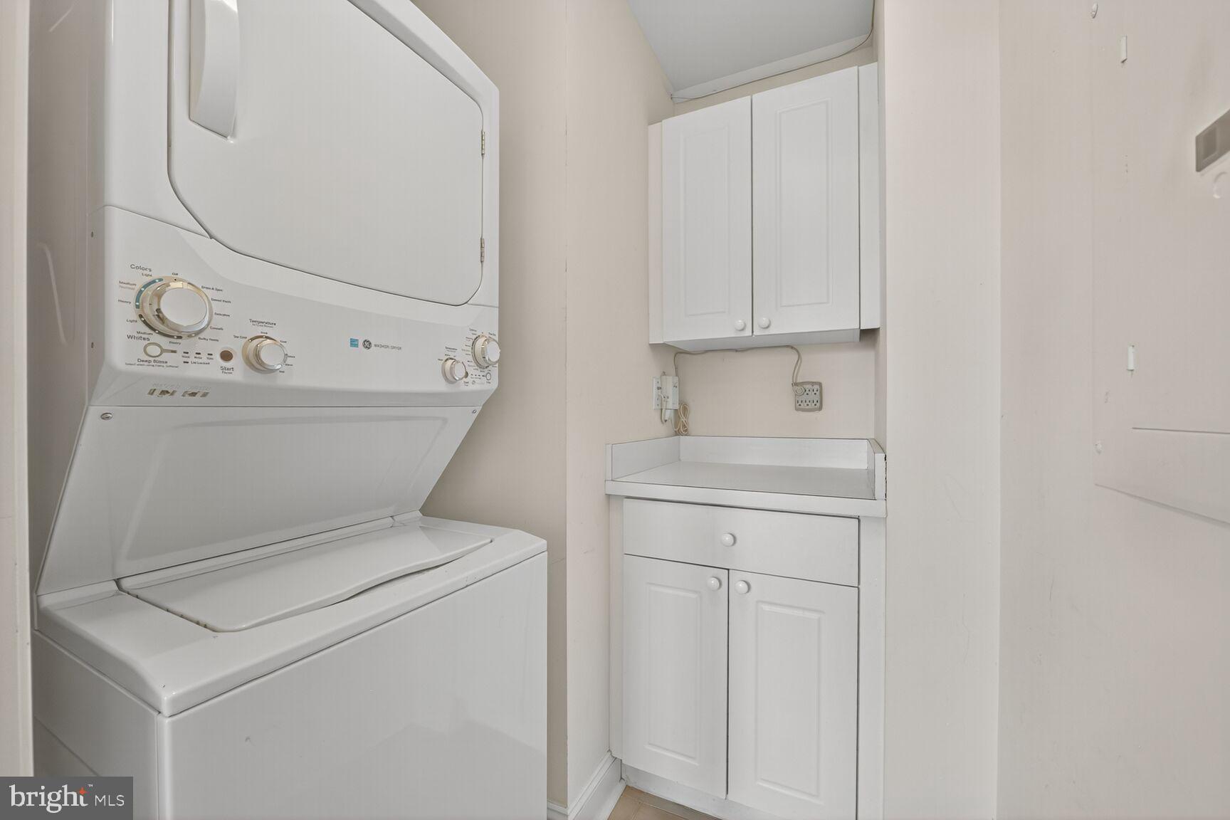11776 Stratford House Place, Unit 507 Reston, VA 20190 - Photo 26 of 40 a utility room with dryer and washer