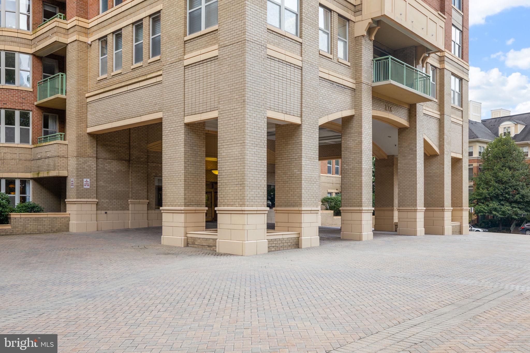 11776 Stratford House Place, Unit 507 Reston, VA 20190 - Photo 38 of 40 a view of a building with a bench