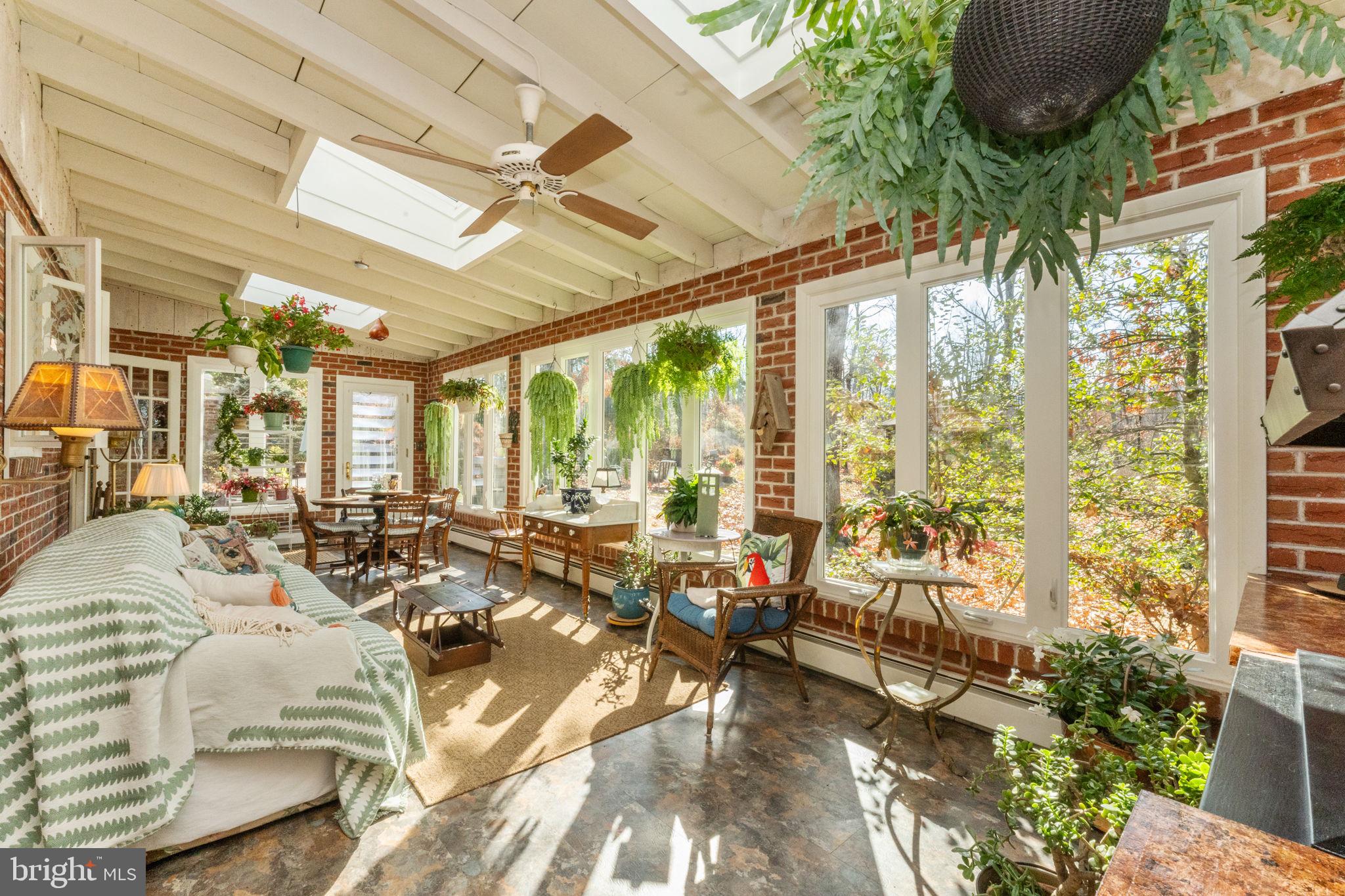 5101 Hiffletrayer Road Green Lane, PA 18054 - Photo 11 of 27 a living room with furniture and floor to ceiling windows