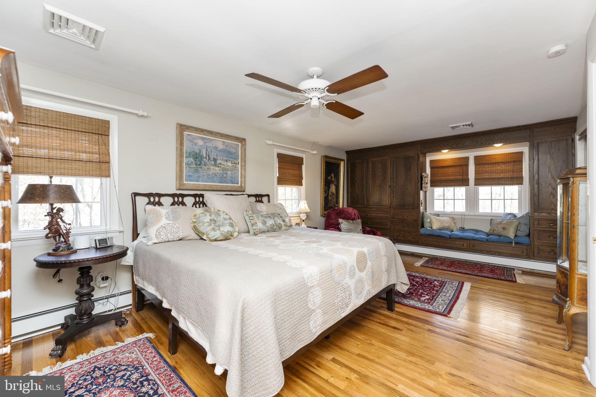 5101 Hiffletrayer Road Green Lane, PA 18054 - Photo 16 of 27 a bedroom with a bed and wooden floor