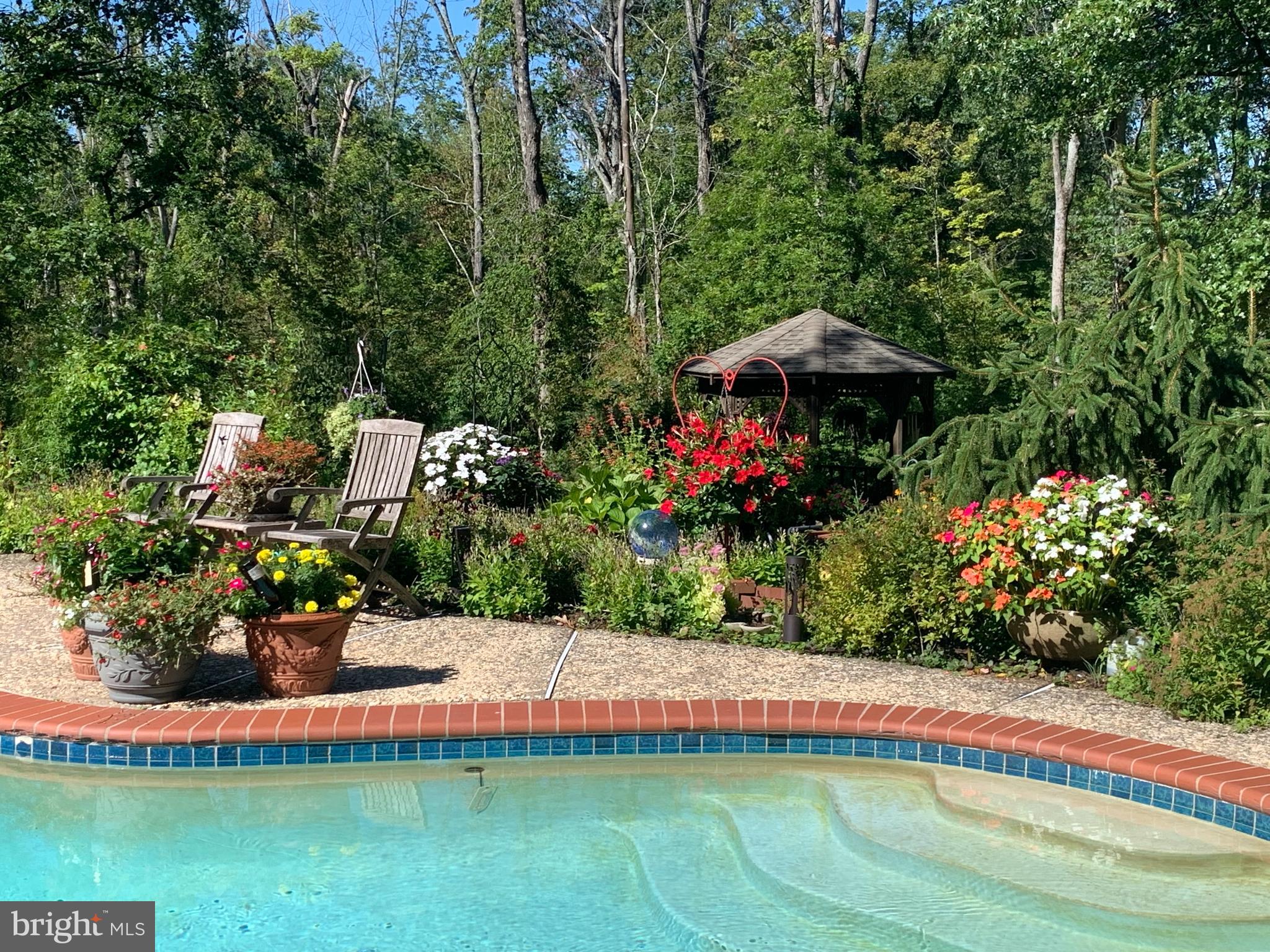 5101 Hiffletrayer Road Green Lane, PA 18054 - Photo 24 of 27 a view of a house with a yard and sitting area