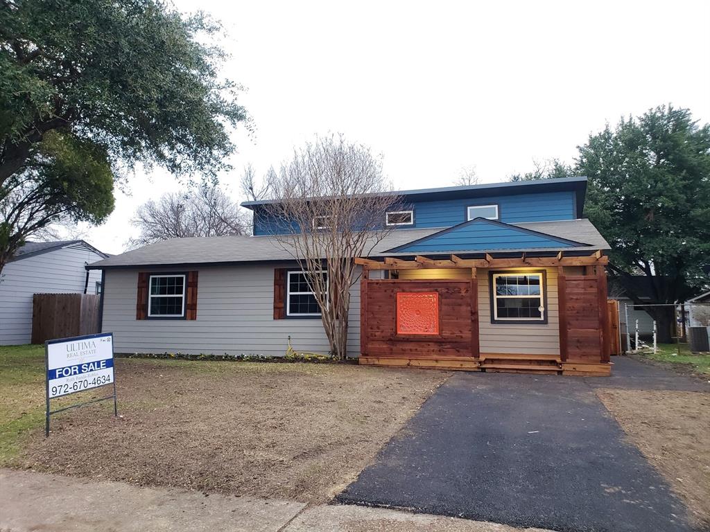 2522 Millmar Drive Dallas, TX 75228 - Photo 1 of 1 a front view of a house with a yard