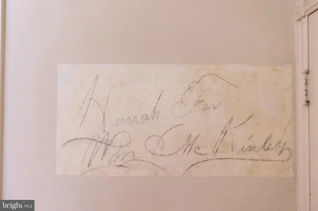 a white marble wall with white paint