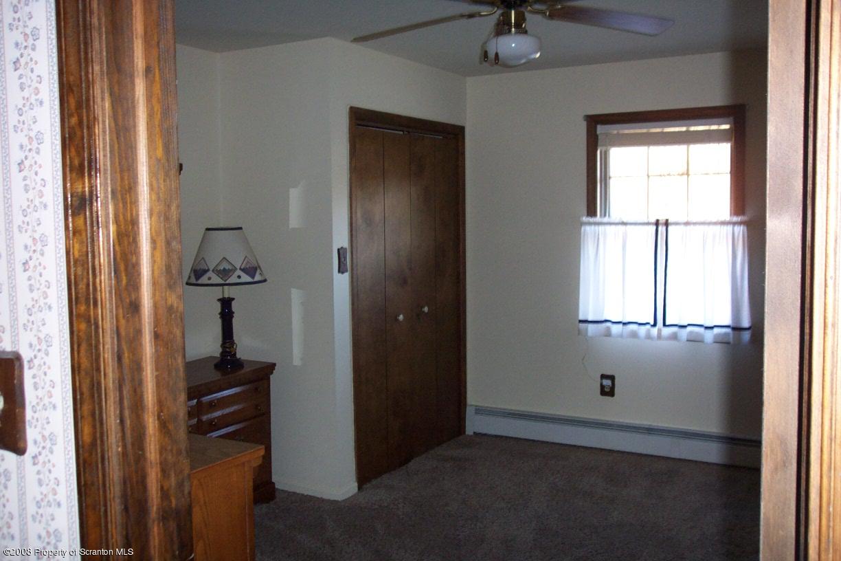 3 Ledge Court Pittston, PA 18640 - Photo 11 of 12 an empty room with windows and closet