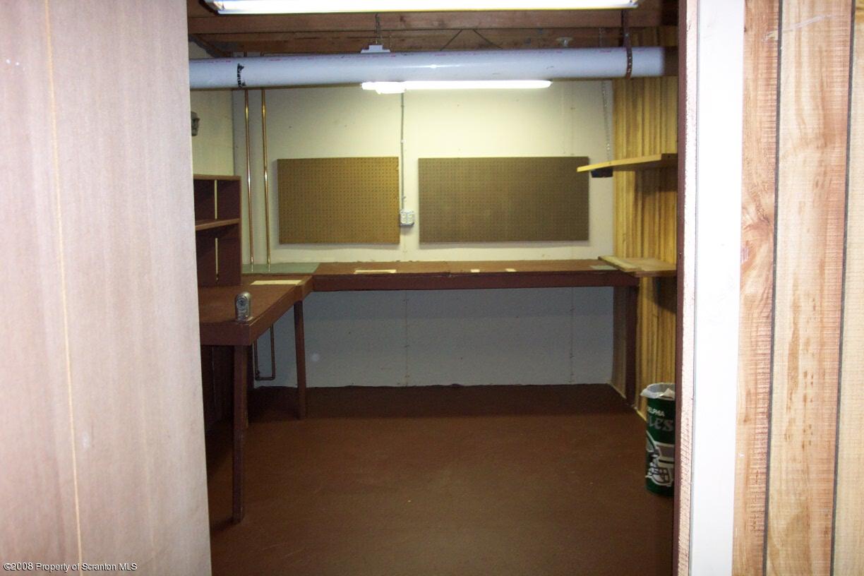 3 Ledge Court Pittston, PA 18640 - Photo 9 of 12 a bathroom with a sink and a mirror