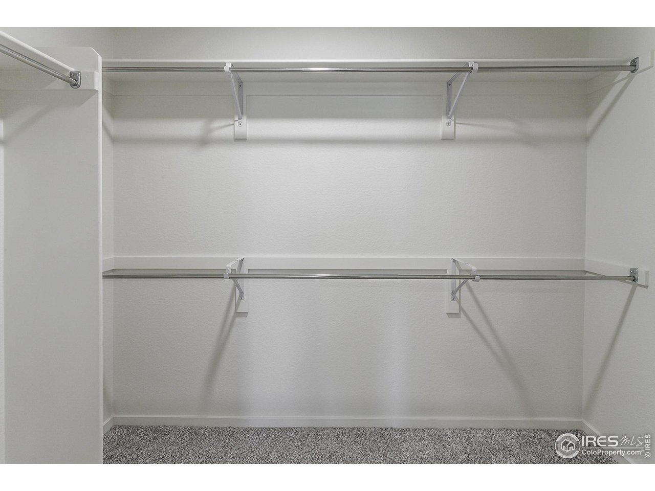 6929 4th St Road, Unit 3 Greeley, CO 80634 - Photo 26 of 38 MASTER BEDROOM WALK IN CLOSET
