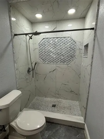 a view of a swimming pool with a porch