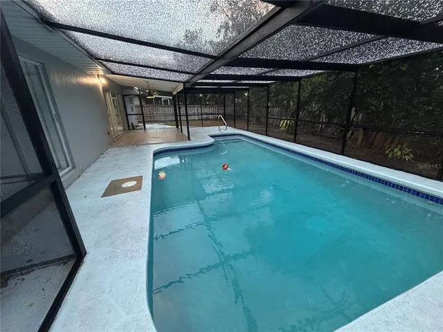 a backyard of a house with seating space