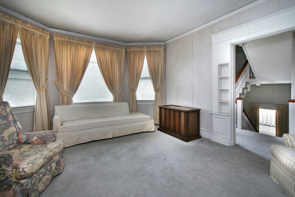 5 Pearson Road Somerville, MA 02144 - Photo 11 of 17 a living room with furniture and a large window