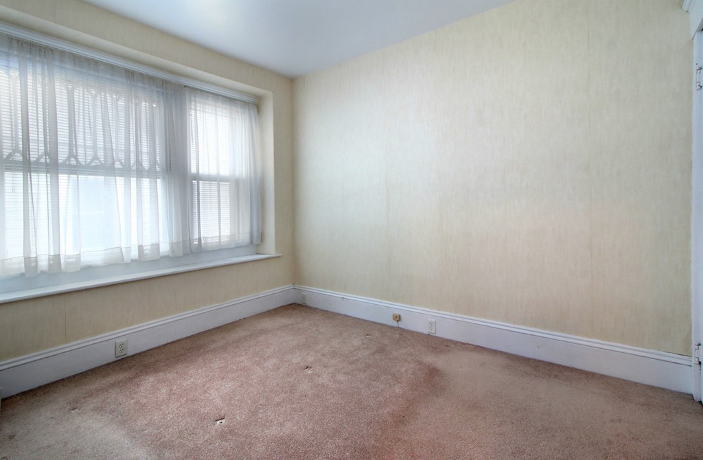 5 Pearson Road Somerville, MA 02144 - Photo 4 of 17 an empty room with a window