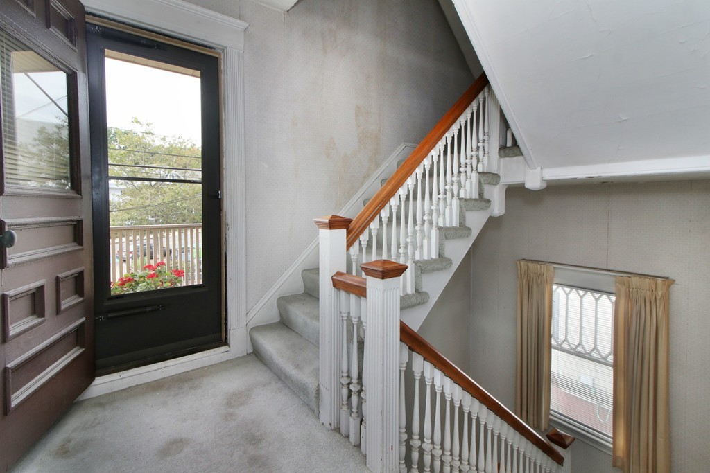 5 Pearson Road Somerville, MA 02144 - Photo 10 of 17 a view of entryway and hall with wooden floor