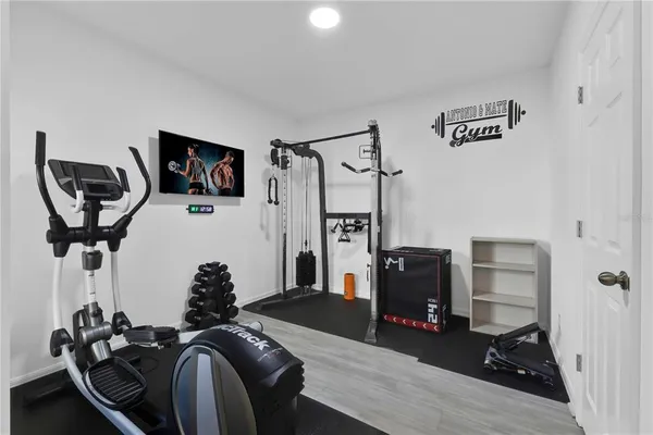 a view of a room with gym equipment