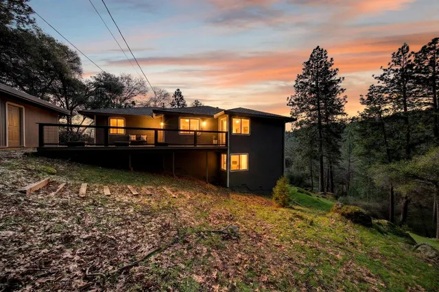 a view of a building with a yard