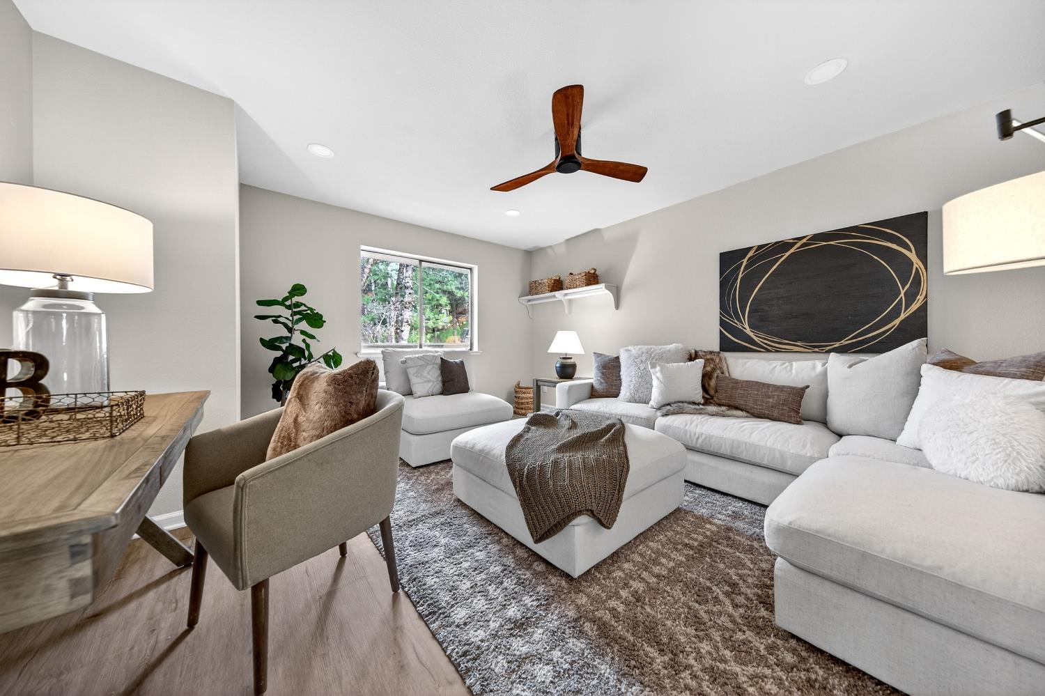 16947 Patricia Way Grass Valley, CA 95949 - Photo 14 of 50 a living room with furniture a rug and a chandelier