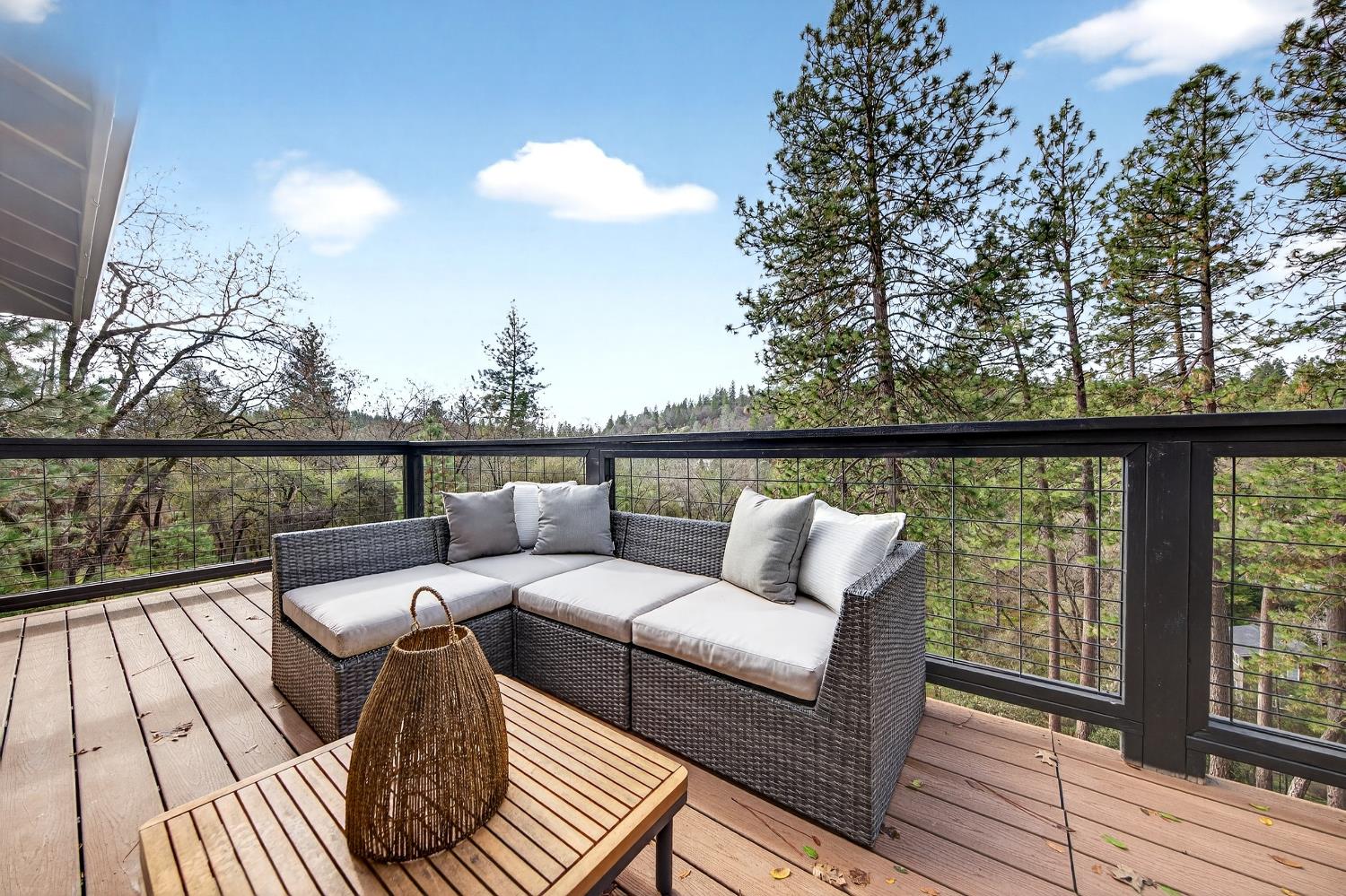 16947 Patricia Way Grass Valley, CA 95949 - Photo 21 of 50 a roof deck with couches and wooden floor