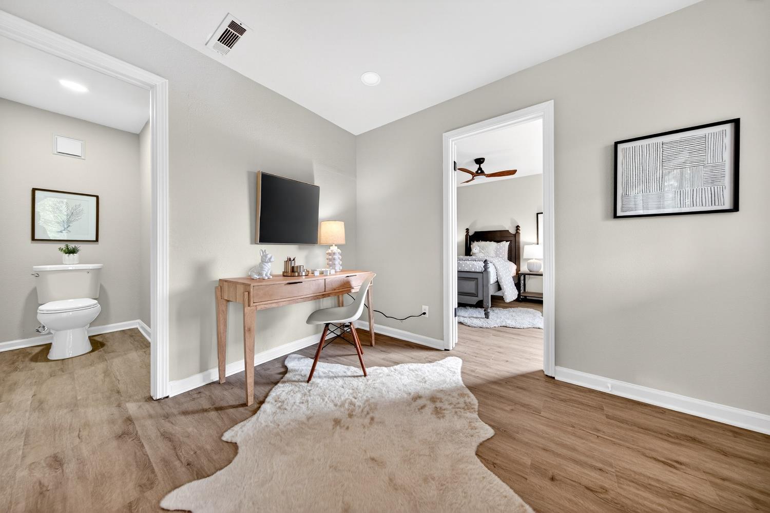 16947 Patricia Way Grass Valley, CA 95949 - Photo 26 of 50 a living room with furniture and a flat screen tv