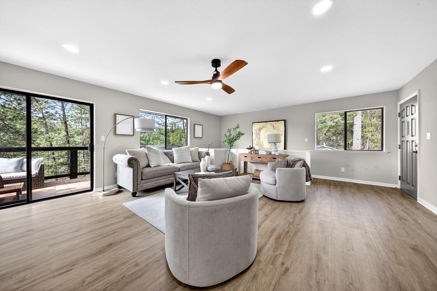 16947 Patricia Way Grass Valley, CA 95949 - Photo 3 of 50 a living room with furniture large window and wooden floor