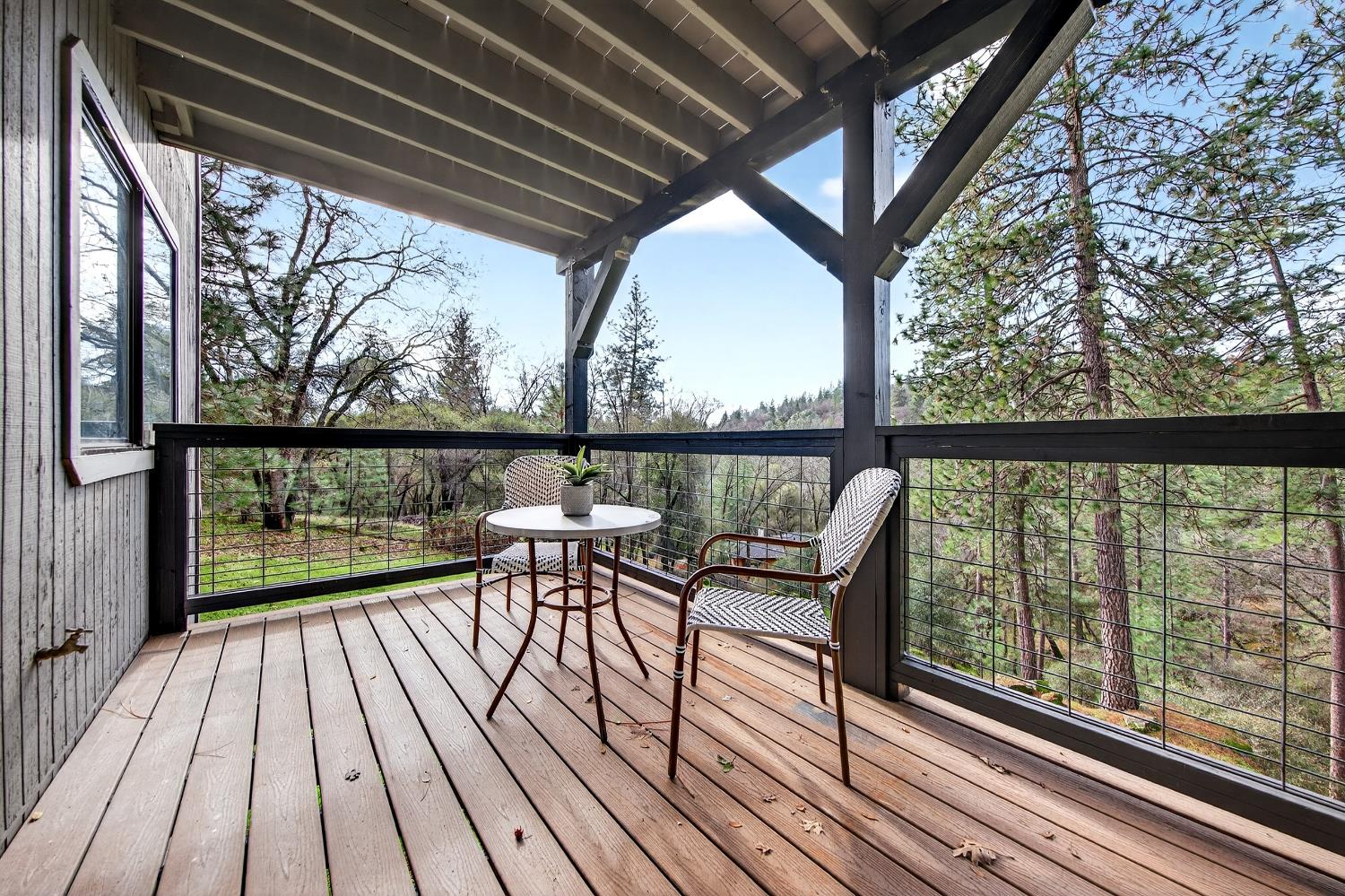 16947 Patricia Way Grass Valley, CA 95949 - Photo 31 of 50 a view of a two chairs in the balcony