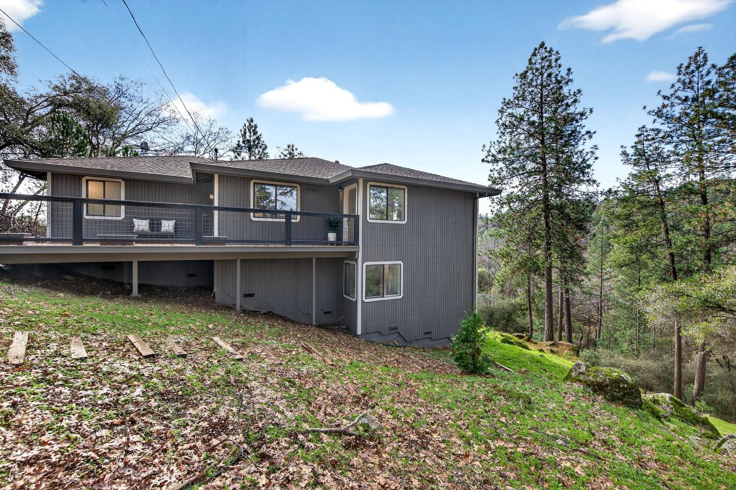 16947 Patricia Way Grass Valley, CA 95949 - Photo 35 of 50 a view of a house with a yard