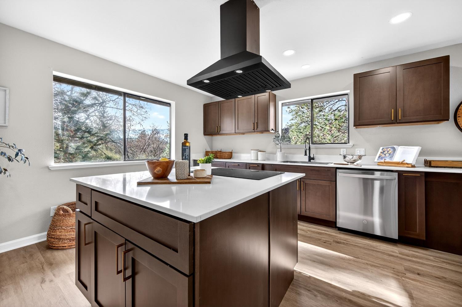 16947 Patricia Way Grass Valley, CA 95949 - Photo 8 of 50 a kitchen with kitchen island granite countertop a sink appliances cabinets and a counter top space