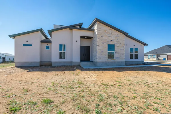 a house view with a outdoor space