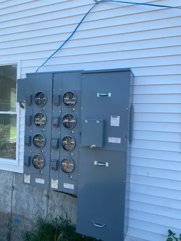 a view of entryway with window and wooden floor