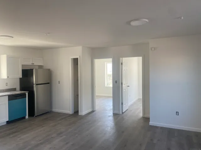a view of a refrigerator in kitchen and a refrigerator